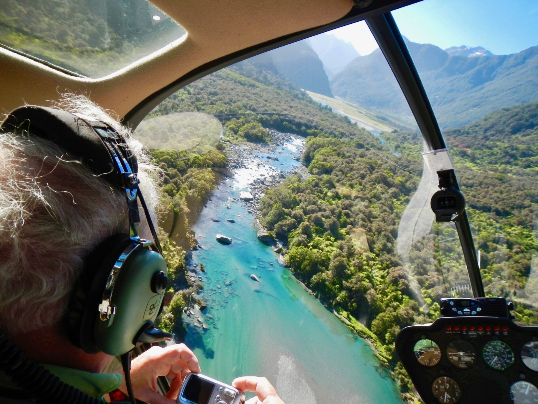 Heli fishing river aerial shot